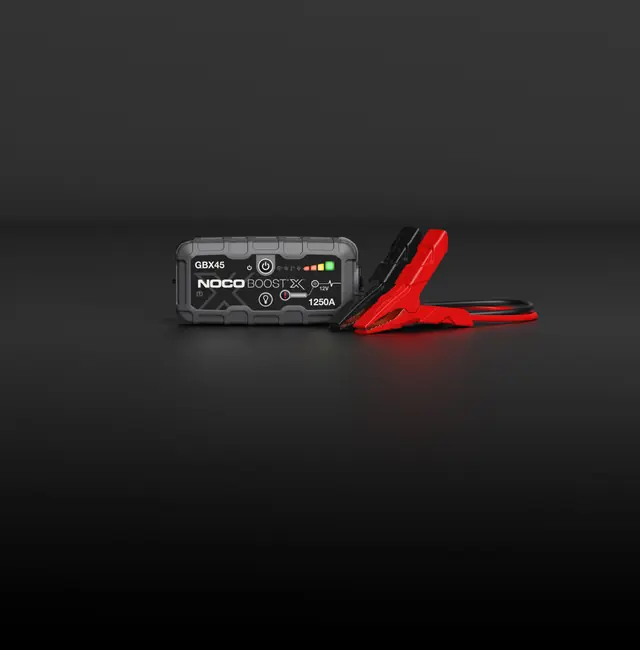 NOCO GBX45 Boost X jump starter with clamps; Australian charging accessories not shown.